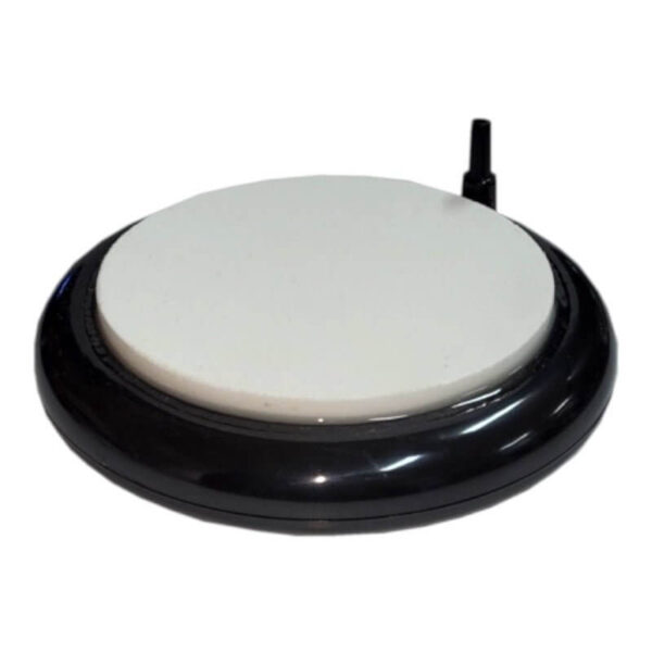 Circular pottery wheel with white rotating surface and black base