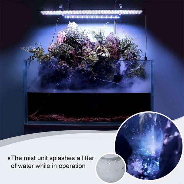 Aquarium with mist unit creating fog under LED light with plants and rocks